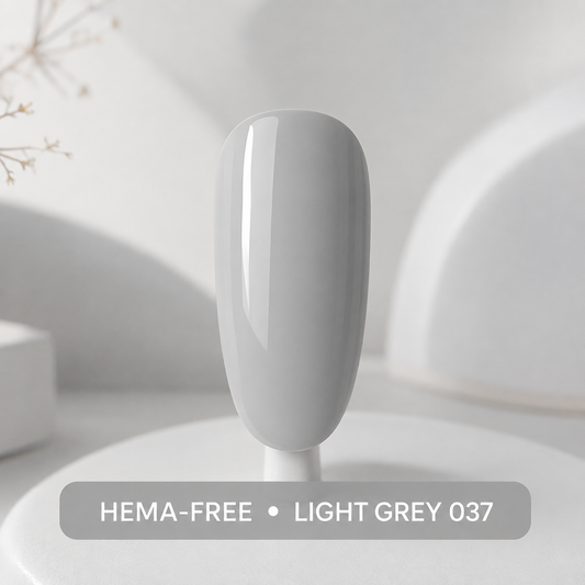 ACOS Hema Free Light Grey 037 gel colour on an artificial nail tip