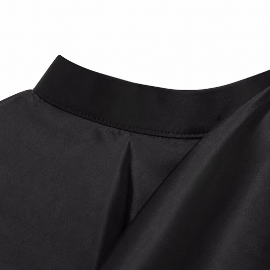 Barber Pole cape black neckline and fabric detail