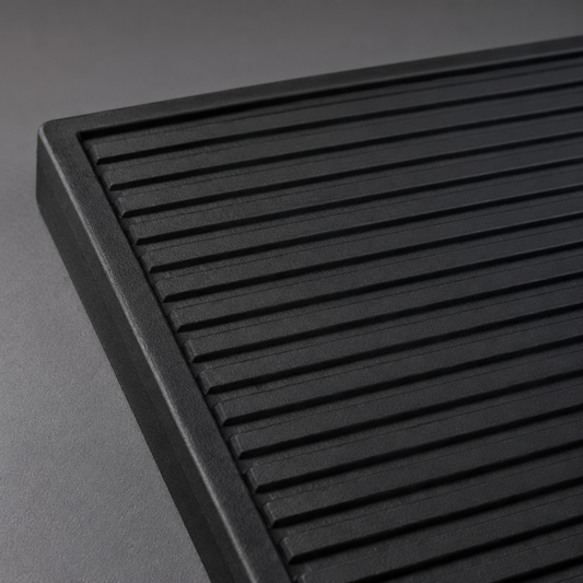 Barbershop 1988 black barber mat ribbed surface and moulded corner detail