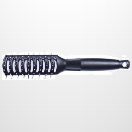 Black plastic vent brush on a light-grey studio background