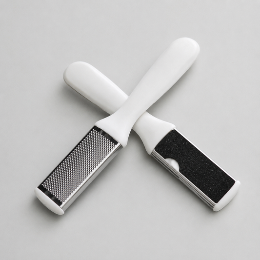 Kiepe white foot file showing the metal rasp and black abrasive working faces