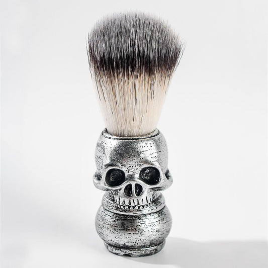 Silver skull-handle shaving brush with dark-to-white bristles