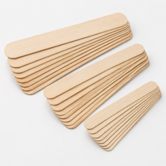 Natural Look wooden salon spatulas arranged in three sizes