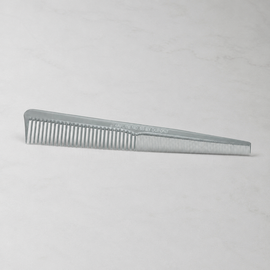 StarFlite No. 55 grey taper comb on a light-grey salon surface