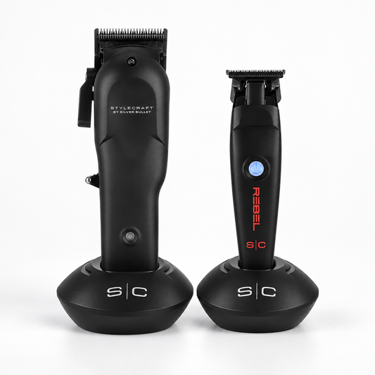 StyleCraft Rebel clipper and trimmer in black charging stands on a light studio background