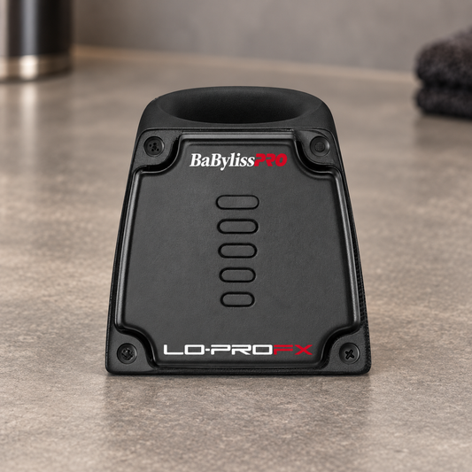 BaBylissPRO LO-PROFX clipper charging base on a barber workstation.