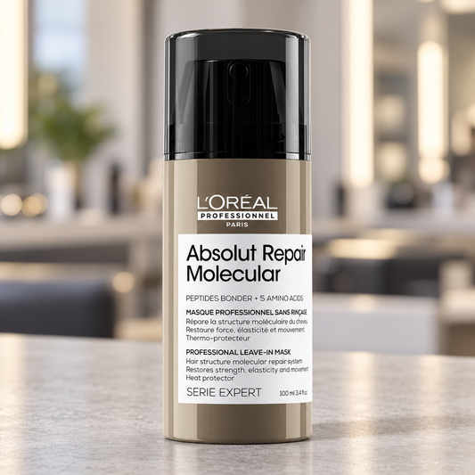 L’Oréal Professionnel Absolut Repair Molecular Leave-in Mask 100ml on a salon counter.