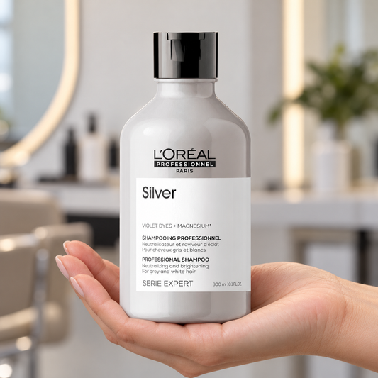 L’Oréal Professionnel Silver Shampoo 300ml held with the label facing forward.