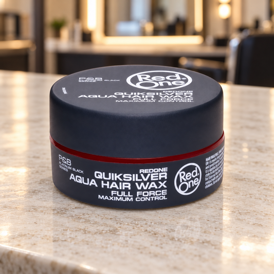 RedOne Quiksilver Aqua Hair Wax Full Force 150ml closed jar on a light barber counter.