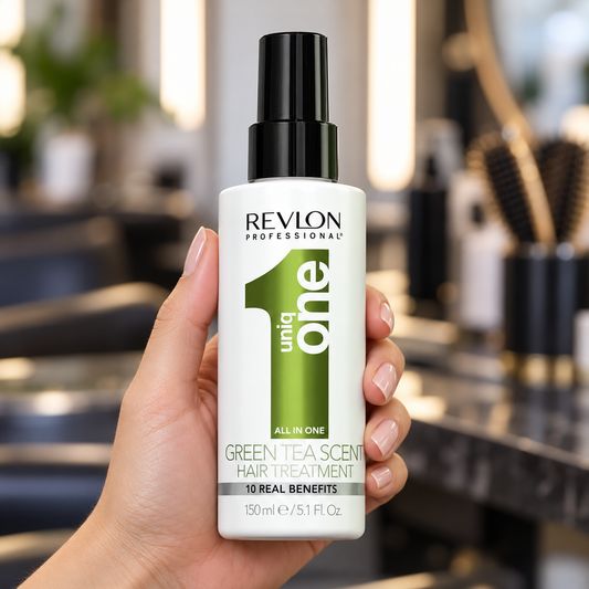 Revlon Uniq One Green Tea hair treatment 150ml bottle held upright with its cap on