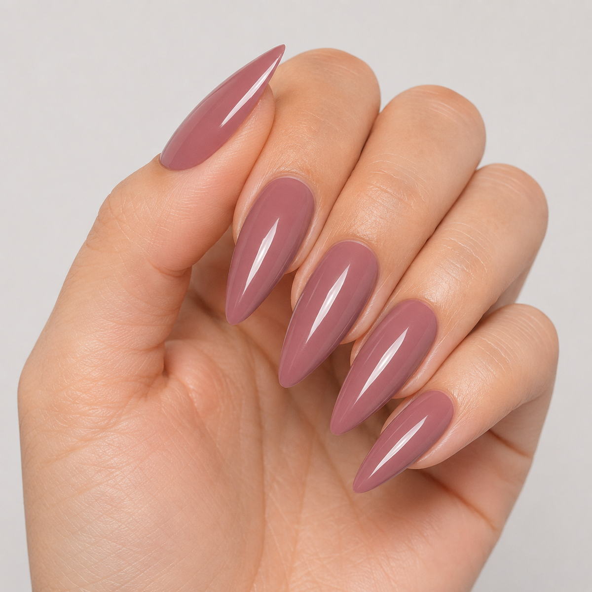 Finished manicure in ACOS Grey Red 029 with a smooth glossy cream finish