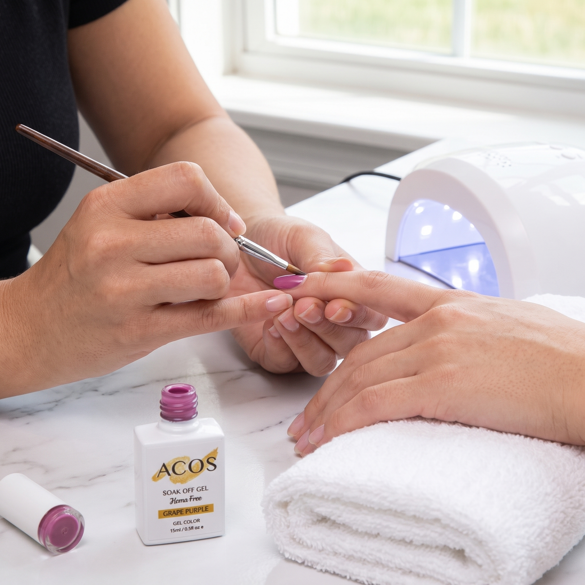 Nail technician applying ACOS Light Grape Purple gel