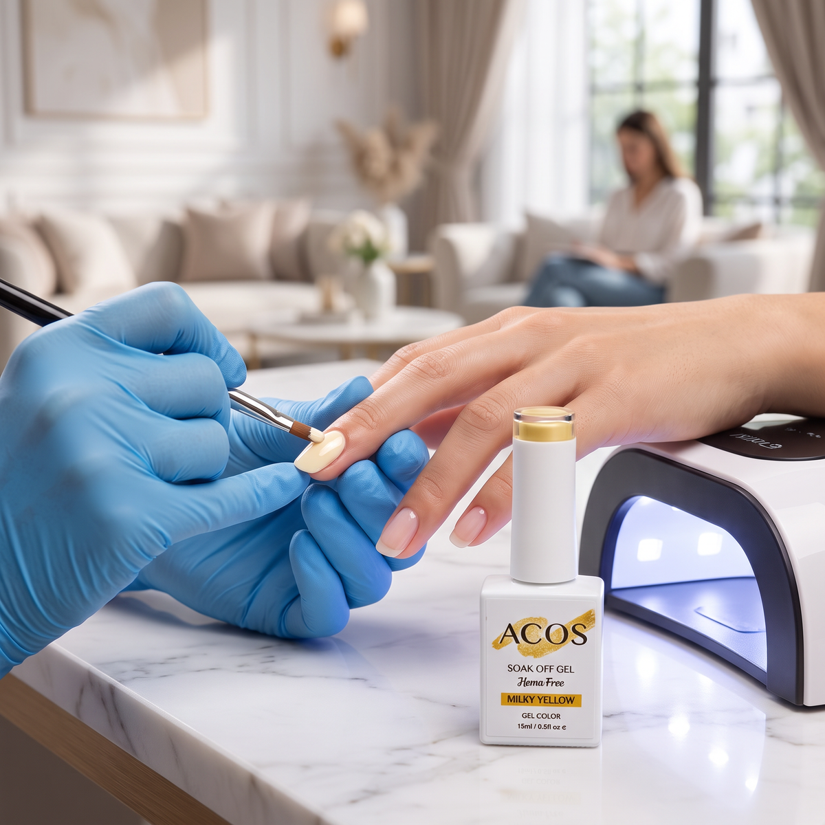 Nail technician applying ACOS Milky Yellow gel