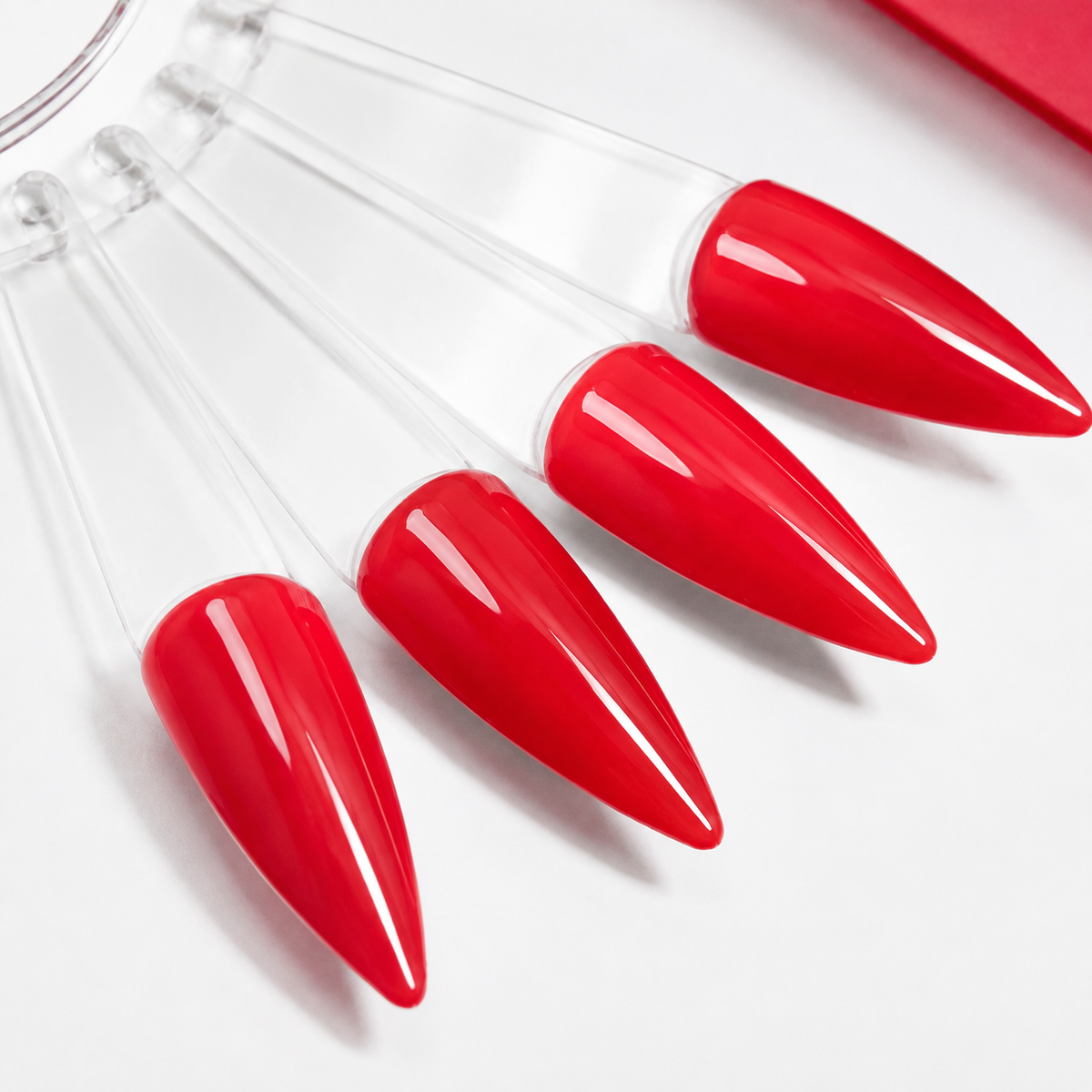 Cured ACOS HF019 Bright Red gel colour shown on glossy artificial nail swatch tips