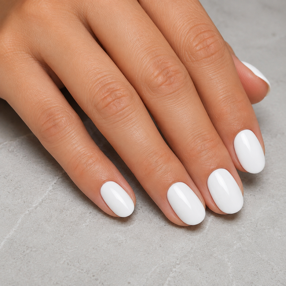 Finished glossy manicure in ACOS Super White 097 gel polish