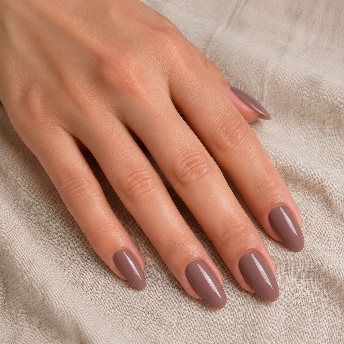 Finished glossy ACOS Dark Brown 050 gel manicure on medium almond nails