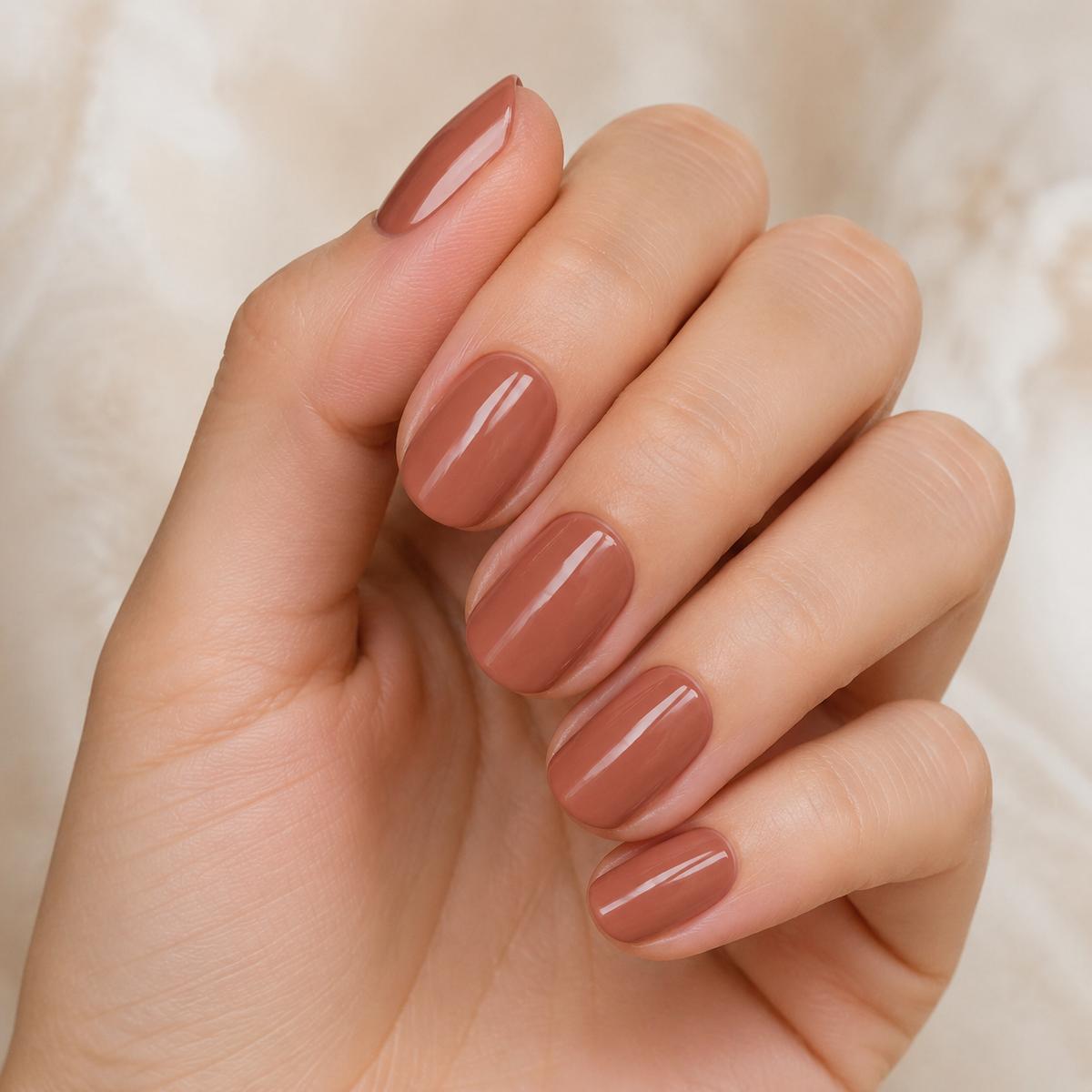 Finished manicure in glossy Light Brown Red 053 gel colour