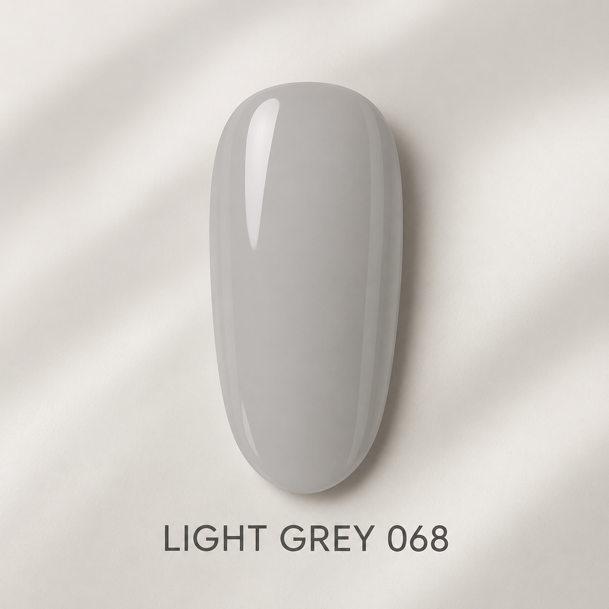 Glossy light grey 068 gel polish colour swatch on a neutral background