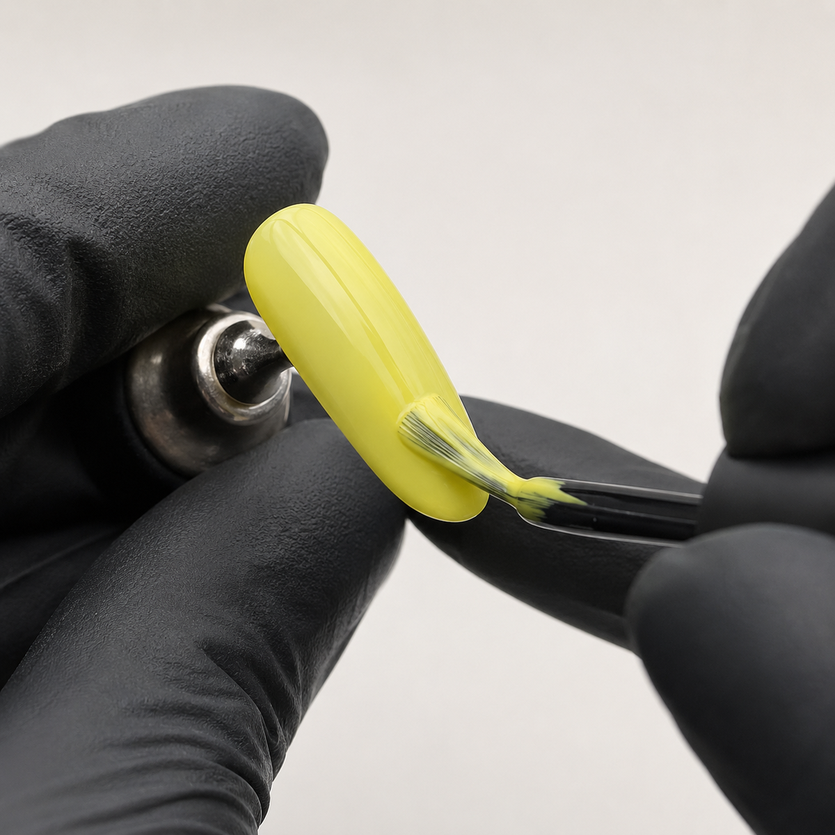 ACOS Slim Yellow 088 applied to an artificial nail practice tip