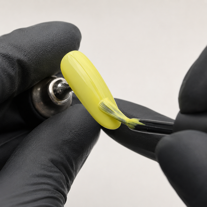 ACOS Slim Yellow 088 applied to an artificial nail practice tip