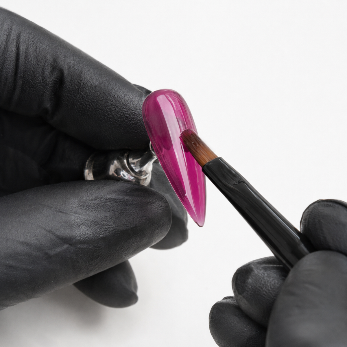 ACOS Transparent Red 078 applied to an artificial nail tip
