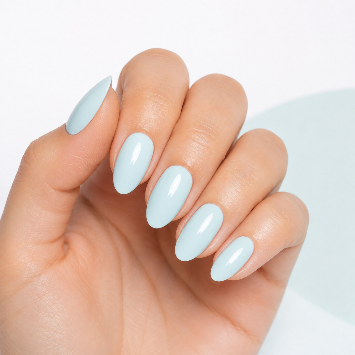 Finished glossy manicure in the pale aqua ACOS Water Blue 027 shade