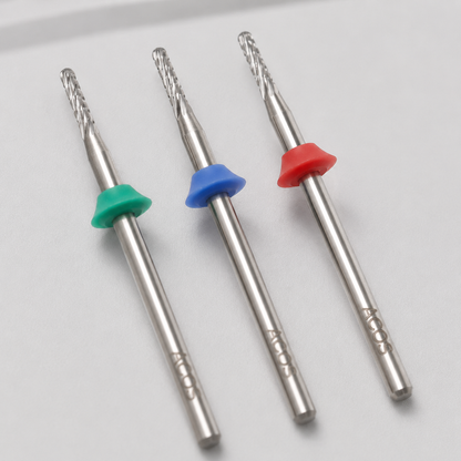 Close detail of ACOS round nail drill bits in coarse, medium and fine grits
