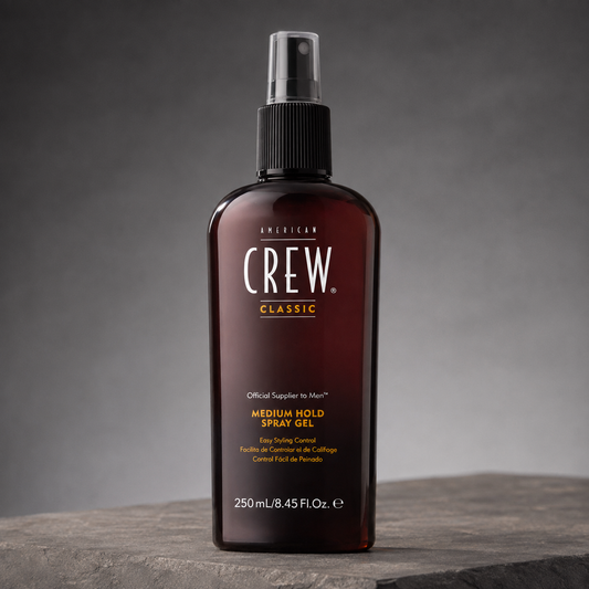American Crew Classic Medium Hold Spray Gel 250ml amber spray bottle in a studio setting