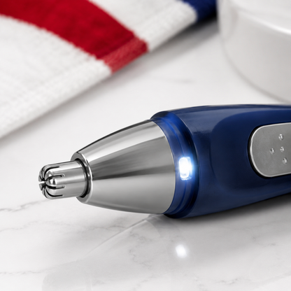 Close detail of Barbasol trimmer stainless-steel rotary head and LED light