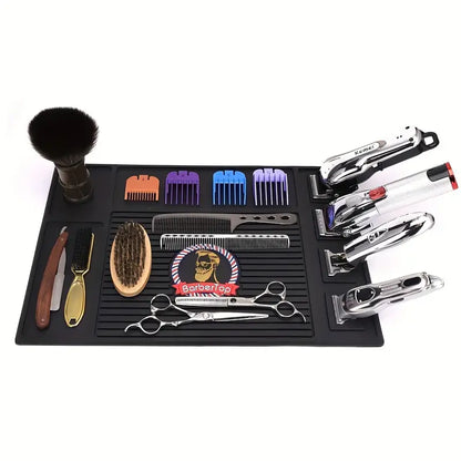BarberTop magnetic barber mat arranged with clippers, guards, combs and brushes