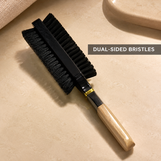 Bymace hair and beard brush showing its dual-sided black bristle head