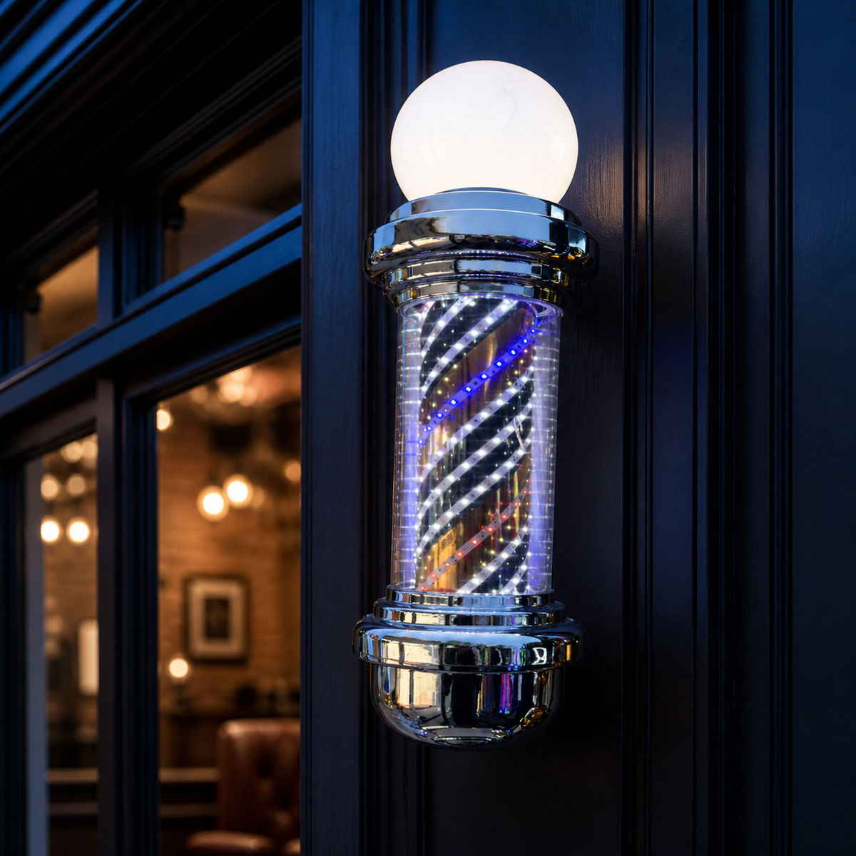 Chrome LED Barber Pole with Globe – 118 x 23cm displayed at a barbershop at dusk