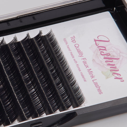 Close-up of super-black C-curl classic lash extension fibres in a Lashmer tray