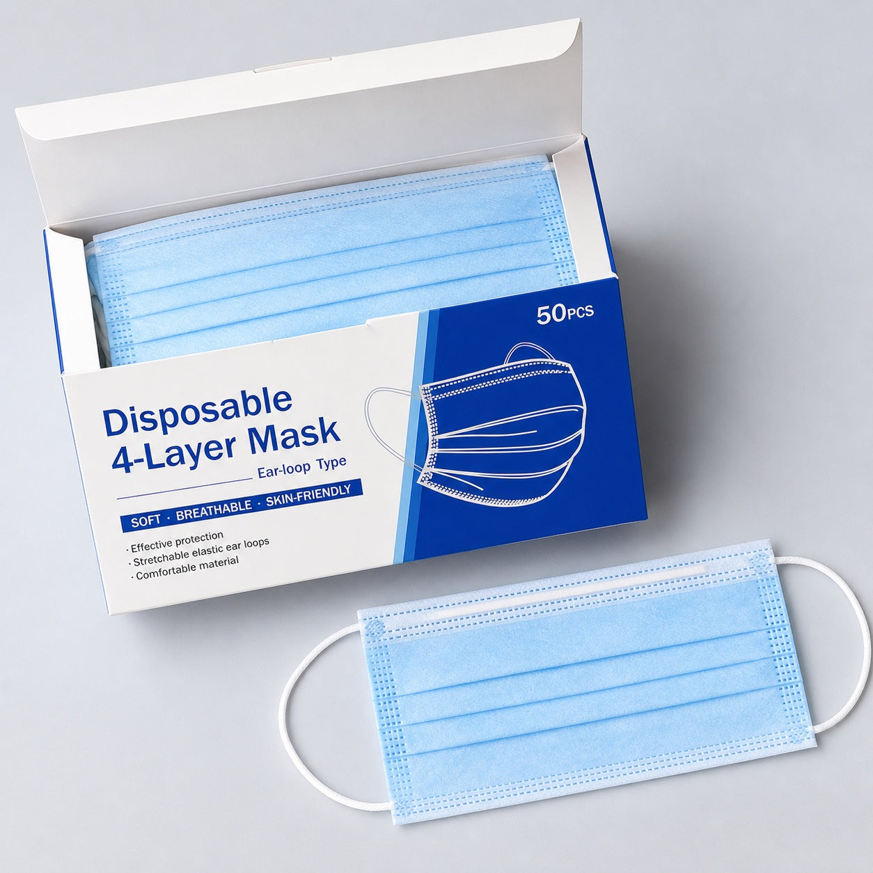 Open box of disposable 4-layer blue ear-loop face masks