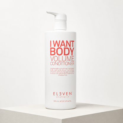 ELEVEN Australia I Want Body Volume Conditioner 960ml white pump bottle in a studio setting