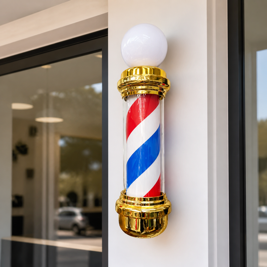 Gold Barber Pole with Globe – 19cm Wide installed on a modern barbershop exterior