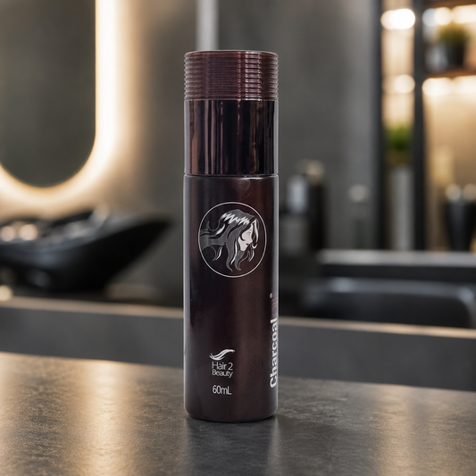 Hair 2 Beauty Charcoal Oil 60ml on a salon counter