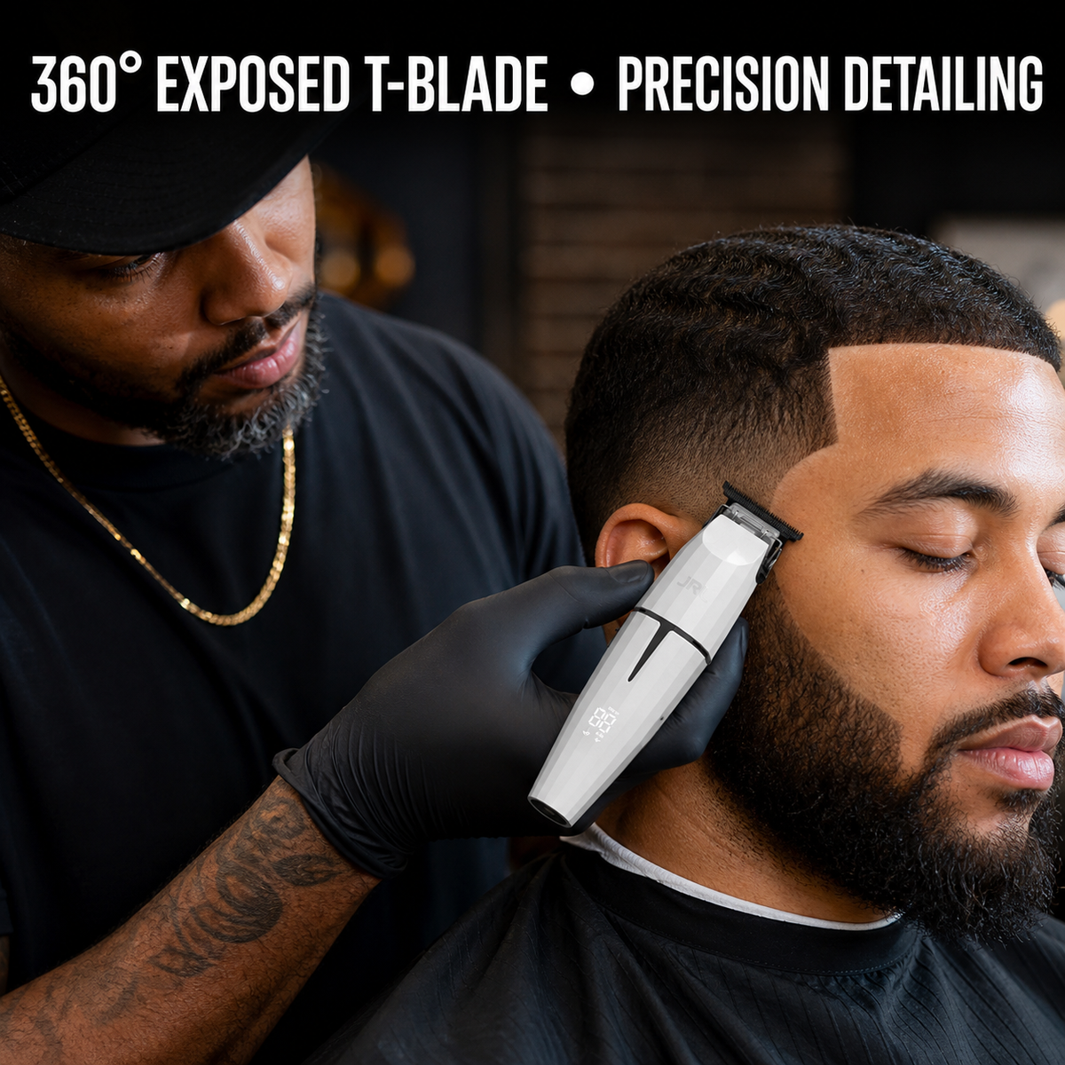 Barber using JRL Onyx Trimmer Ghost White with exposed T-blade precision detailing benefit text