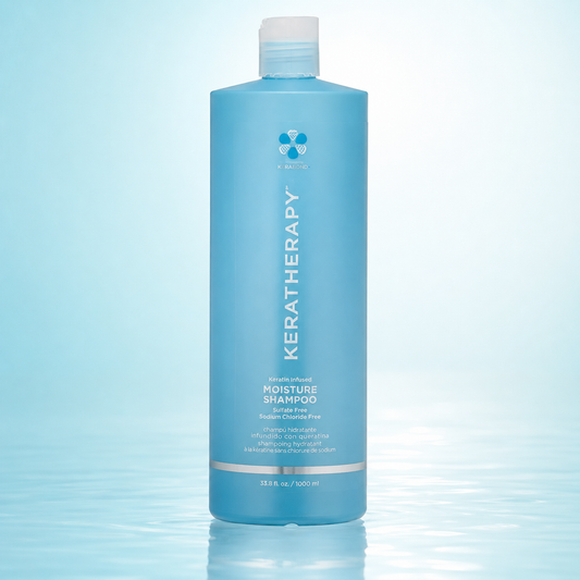 Keratherapy Keratin Infused Moisture Shampoo 1L on a pale aqua studio surface