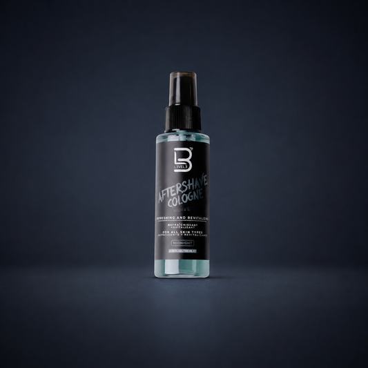 L3VEL3 Midnight Aftershave Cologne 100ml spray bottle on a dark blue studio background