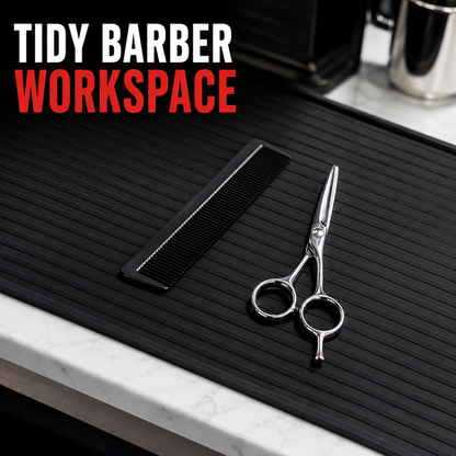 Tidy barber workspace graphic featuring a black ribbed barber mat