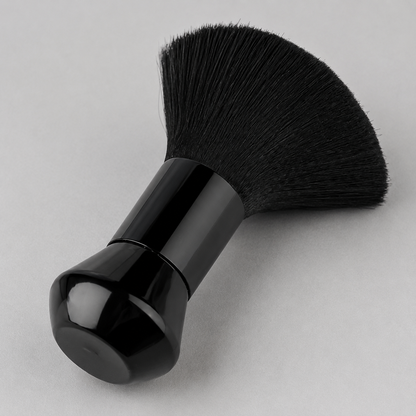 Close detail of black neck duster bristles, ferrule and faceted short handle