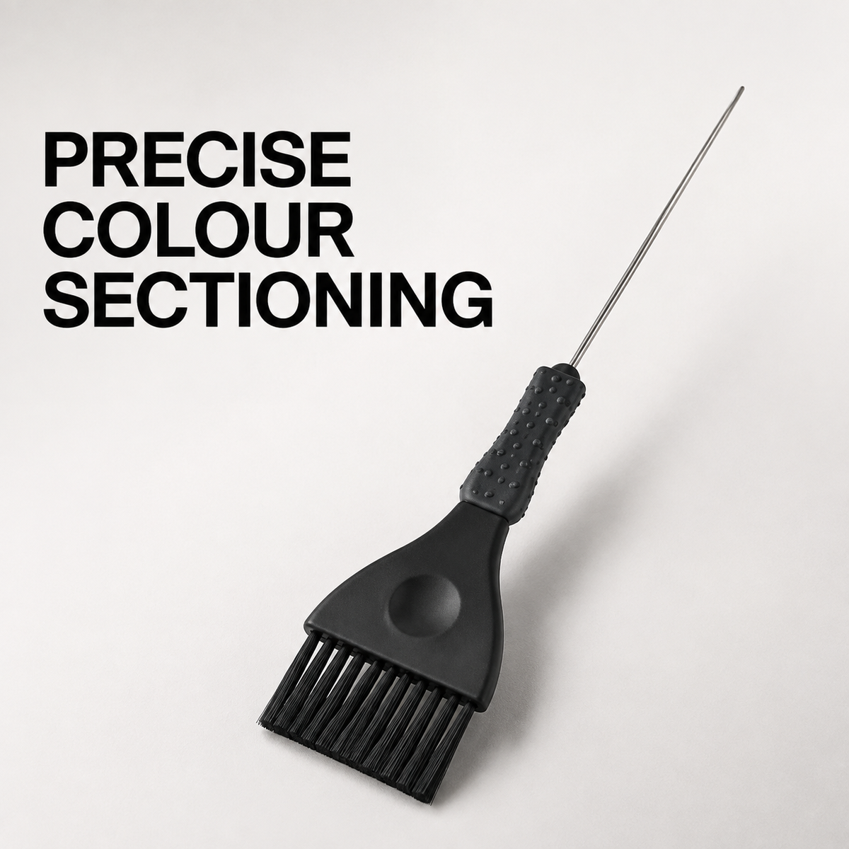 Black tint brush with metal pin graphic for colour application and sectioning