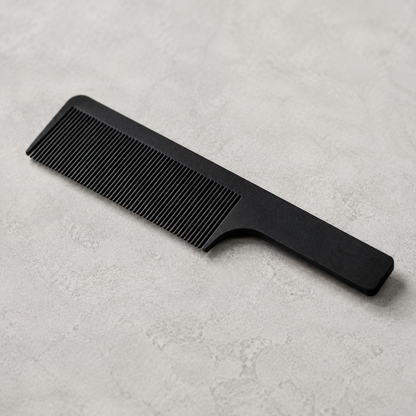 Close detail of the MV black carbon fibre flat comb teeth and handle