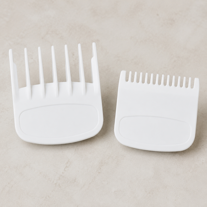 White 0.5 and 1.5 clipper guide combs shown side by side