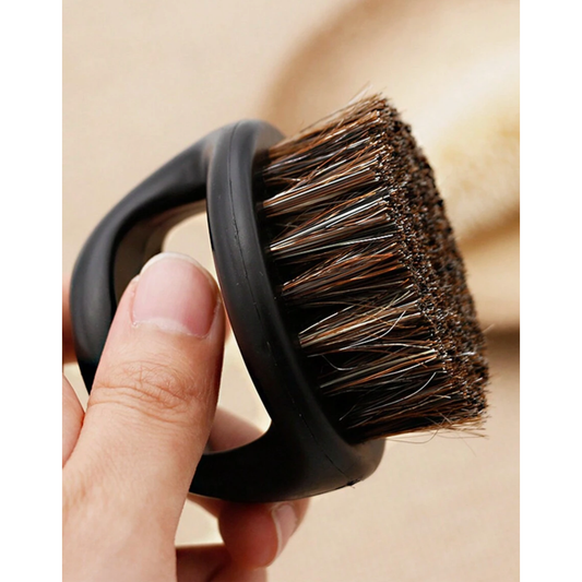 Close-up of the MV finger-grip duster brush handle and dense bristles