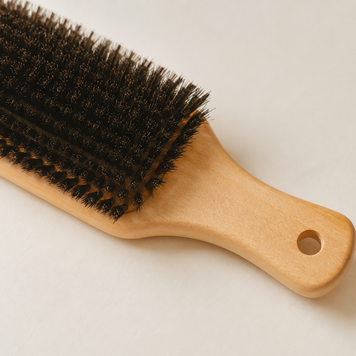 Close view of the MV flat wood paddle brush bristles and handle