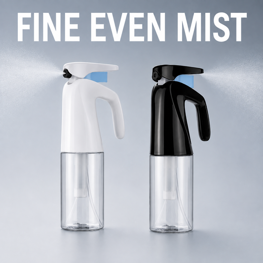 White and black MV handheld mist bottles producing a fine water spray