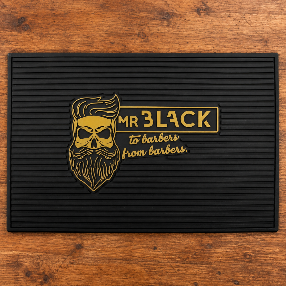 MV Mr Black Barber Tool Mat – Black shown alone on a wooden workstation