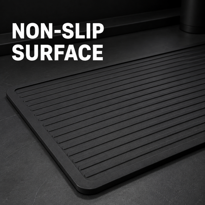 Black barber mat with non-slip grooved surface